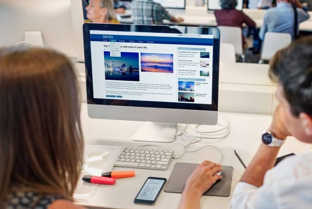 couple looking at website on computer